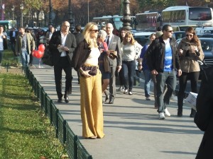 Playfully swapping jackets with a passerby