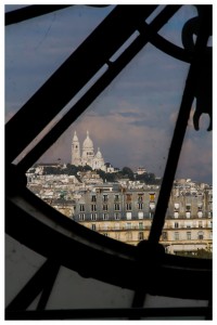 A view of the Sacre Coeur through the clock window at Musee d'Orsay.