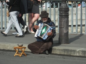 Always the accordian player crossing between the islands on the pedestrian bridge