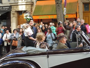 The "queen" of the parade with grapes entertwined in her hairdo