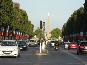 The Champs Elysees still decorated from Bastille Day and the upcoming finale of Le Tour de France.