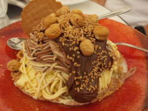 This sinful creation was our dessert for lunch in Vienna at a street cafe.  It was called Spaghetti and Nutella.  The "spaghetti" was actually different kinds of ice cream.  Big hazel nuts are on top!